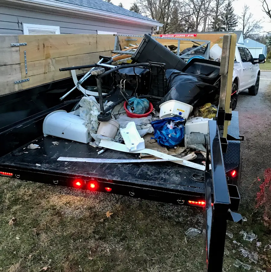 Roll-off dumpster delivered to a residential driveway in Patchogue